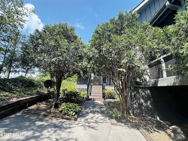 1132 E Foothills Dr, Gatlinburg, TN 37738 - view of front of home with board and batten siding and stairway