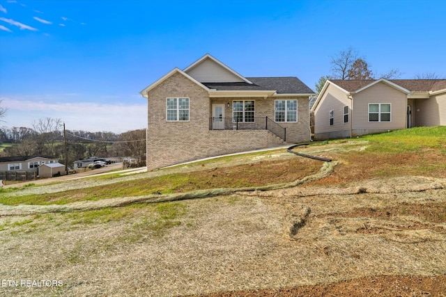 view of front of house featuring a front yard