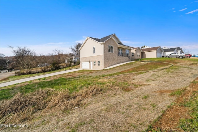 view of property exterior featuring a garage