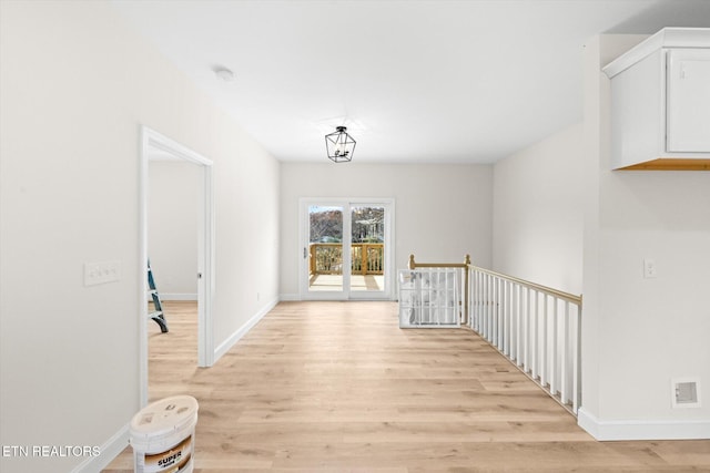 hall featuring light hardwood / wood-style flooring