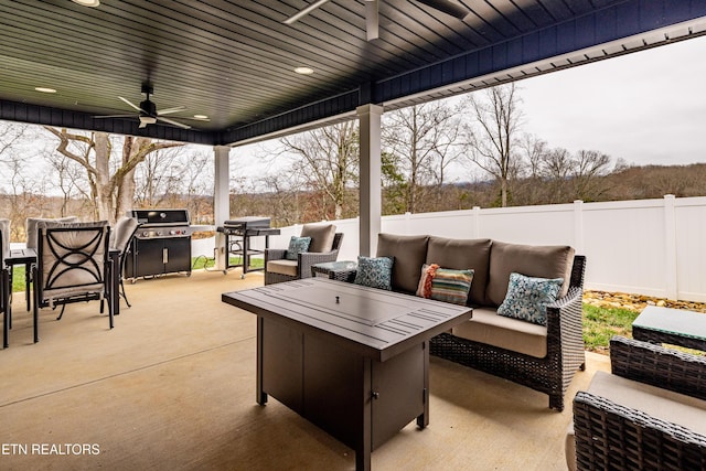 view of patio / terrace featuring ceiling fan, area for grilling, and an outdoor hangout area