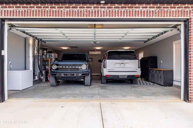 garage featuring a wall mounted air conditioner