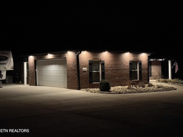 view of front of property featuring a garage