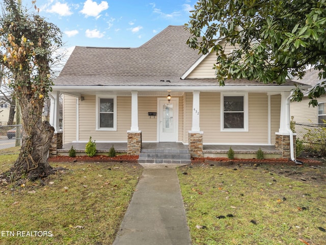 bungalow with a front lawn