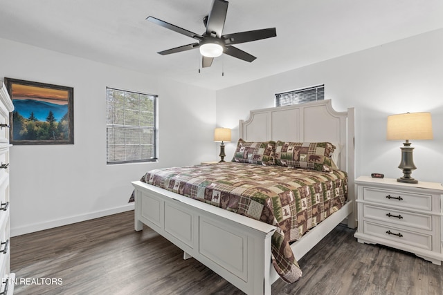 bedroom featuring ceiling fan and dark wood-type flooring