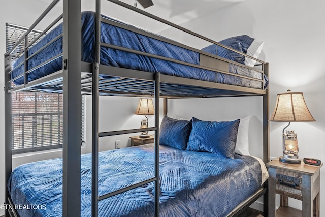 bedroom featuring wood-type flooring