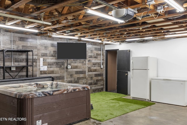 interior space featuring dark brown cabinets and white refrigerator