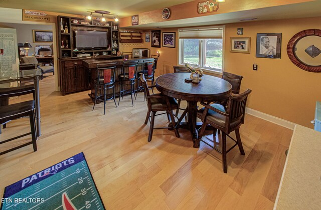 dining room featuring light wood-type flooring