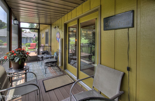 sunroom / solarium with wooden ceiling