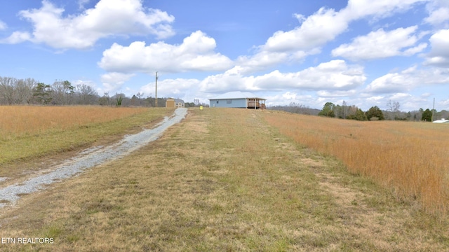 view of road featuring a rural view