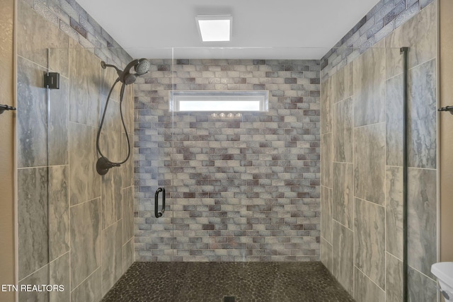 bathroom featuring walk in shower