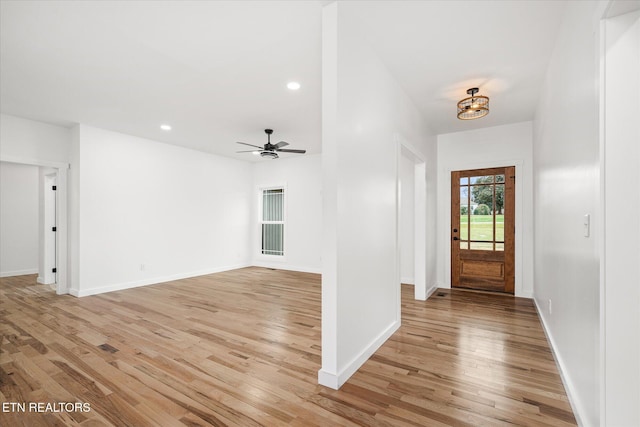 entryway featuring ceiling fan and light wood-type flooring