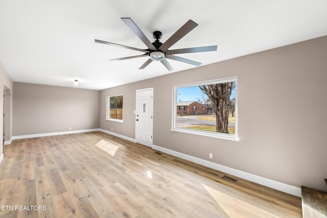 interior space featuring ceiling fan and light hardwood / wood-style floors