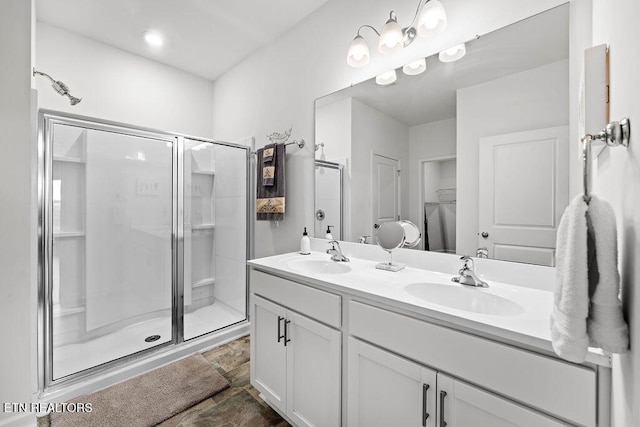 bathroom with vanity and walk in shower