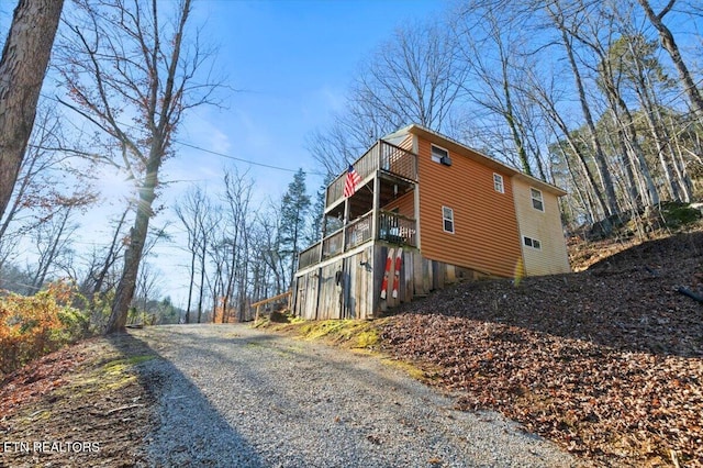 291 Marina Ln, Lafollette, TN 37766 - view of home's exterior with a balcony and a deck