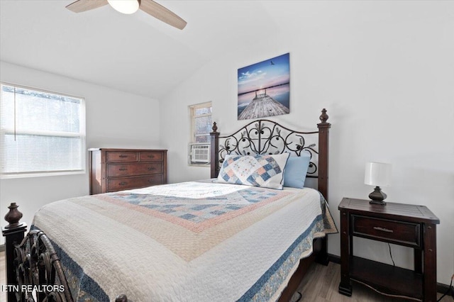 291 Marina Ln, Lafollette, TN 37766 - bedroom featuring ceiling fan, cooling unit, wood-type flooring, and lofted ceiling