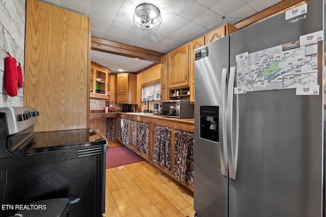 291 Marina Ln, Lafollette, TN 37766 - kitchen with sink, appliances with stainless steel finishes, and light hardwood / wood-style flooring