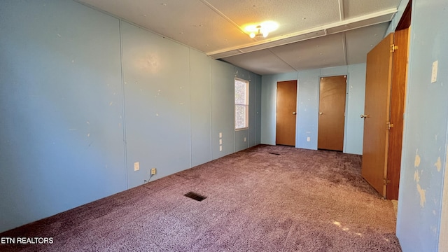 unfurnished bedroom with carpet