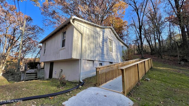 view of home's exterior with a yard