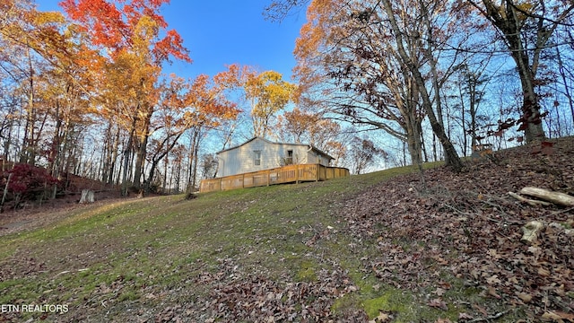 view of yard with a deck