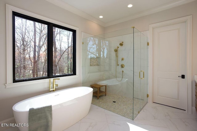 bathroom with shower with separate bathtub and crown molding