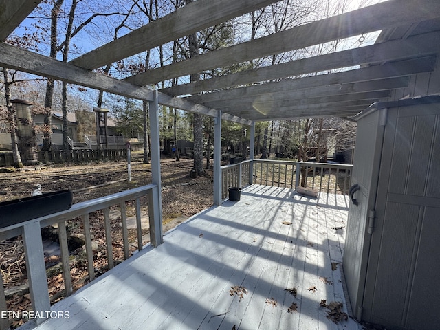 wooden deck featuring a pergola