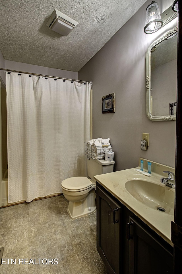 full bathroom with vanity, a textured ceiling, toilet, and shower / bathtub combination with curtain