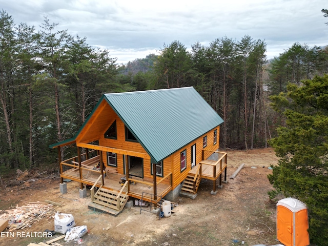 view of front of house with a wooden deck