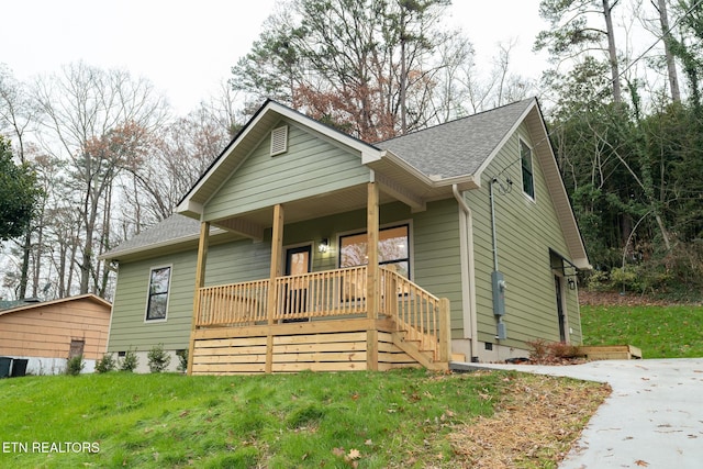 view of front facade with a porch and a front yard