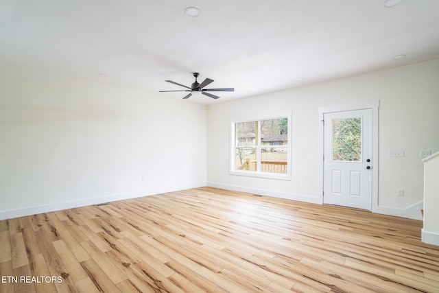 interior space featuring light wood-type flooring and ceiling fan