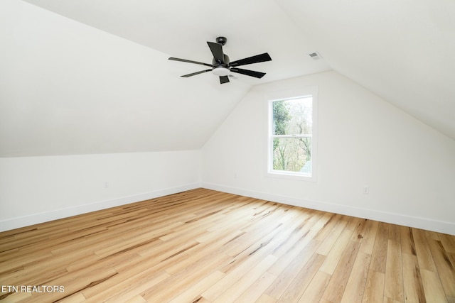 bonus room with ceiling fan, light hardwood / wood-style floors, and lofted ceiling