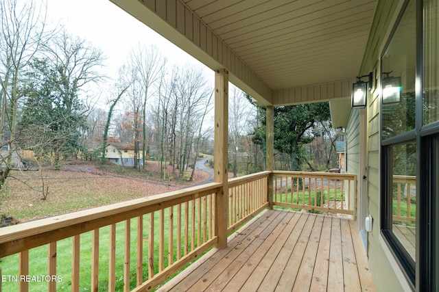 deck featuring a yard