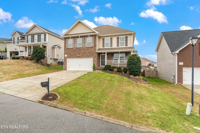 view of front of property with a garage and a front yard