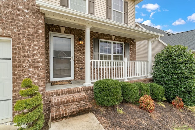 entrance to property with covered porch