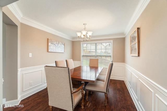 dining room with a chandelier, dark hardwood / wood-style floors, and ornamental molding