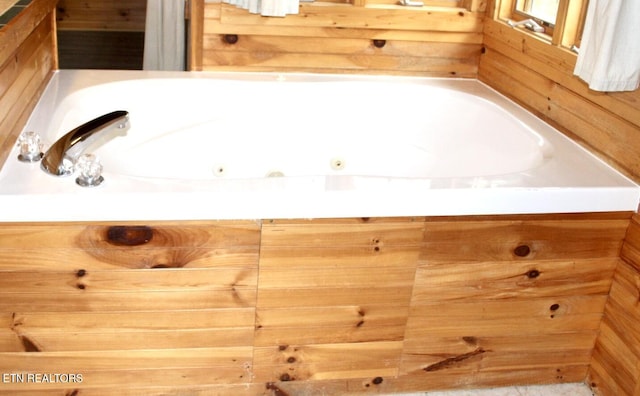 bathroom featuring a bath