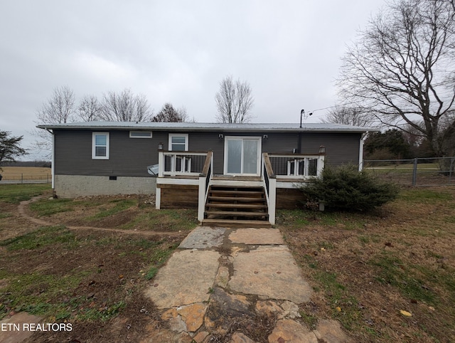 view of front facade featuring a deck