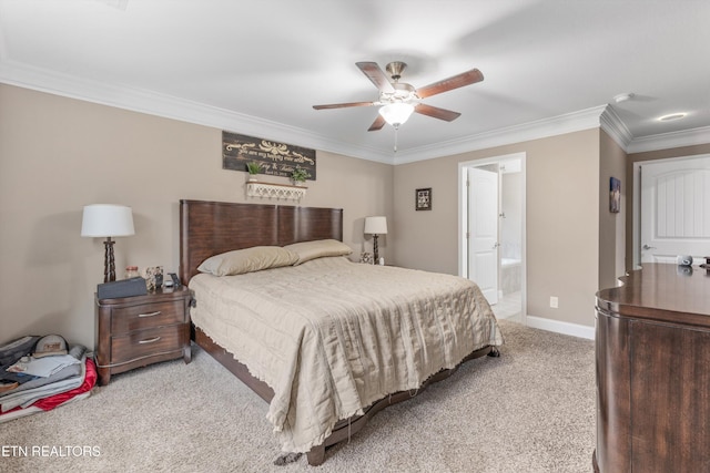 bedroom featuring carpet, ensuite bathroom, ornamental molding, a ceiling fan, and baseboards