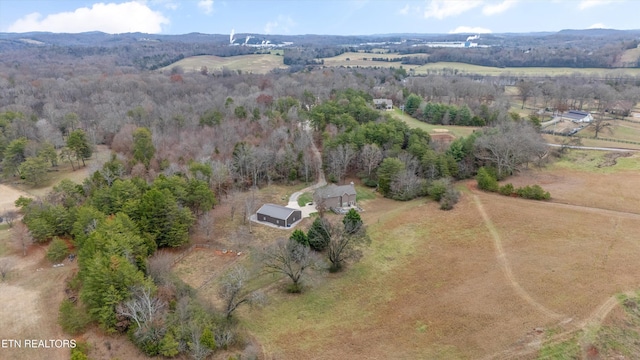 birds eye view of property featuring a rural view