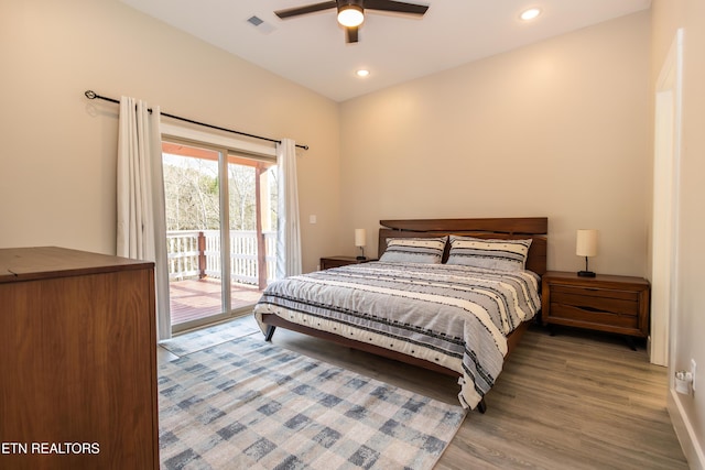 bedroom featuring wood-type flooring, access to outside, and ceiling fan