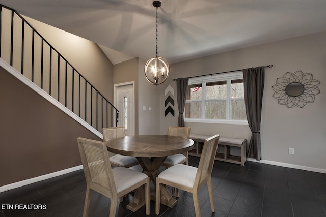 dining area featuring a chandelier