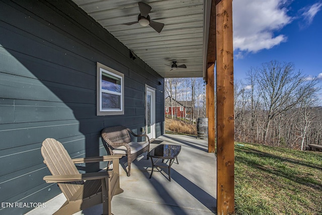 view of patio featuring ceiling fan