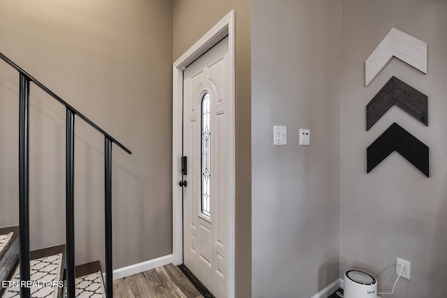 foyer with light hardwood / wood-style floors