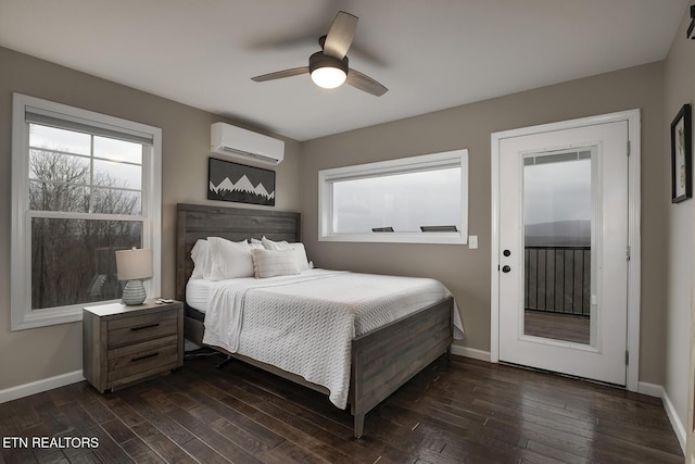 bedroom featuring ceiling fan, dark hardwood / wood-style flooring, and an AC wall unit