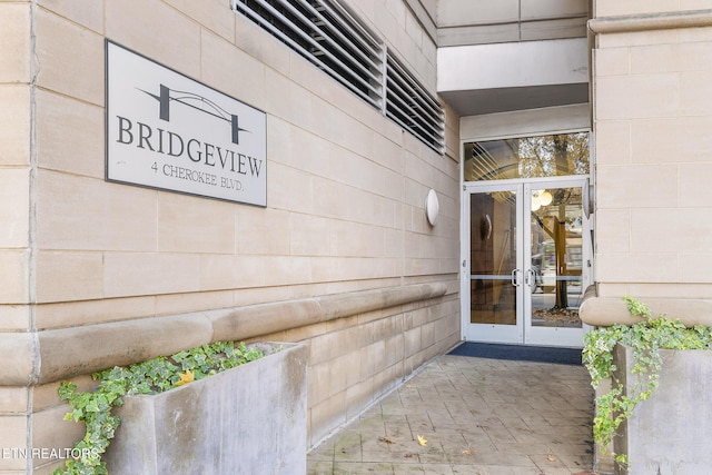 property entrance featuring french doors