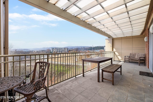 balcony featuring a mountain view