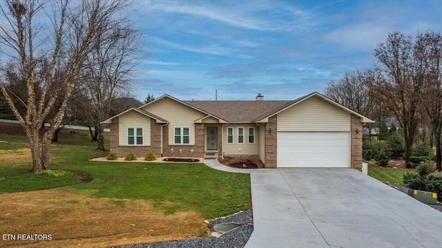 ranch-style house featuring a front yard and a garage