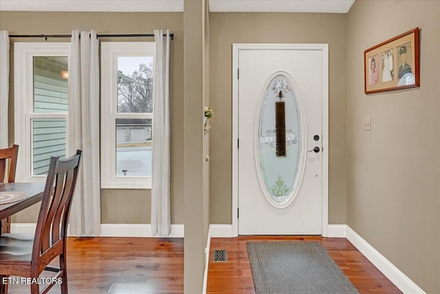 foyer featuring hardwood / wood-style floors