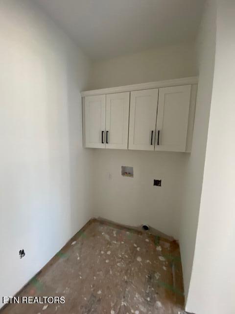 laundry room with cabinets and hookup for a washing machine