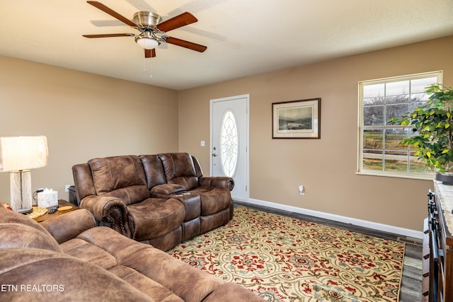 living room with ceiling fan